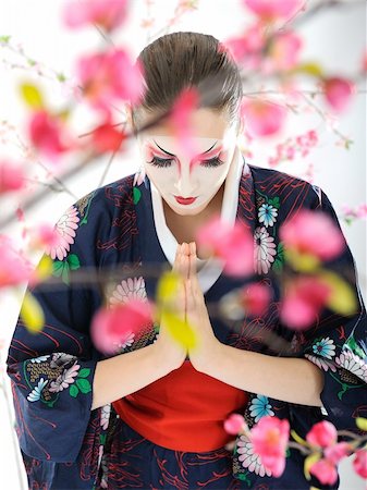 Artistic portrait of japan geisha woman with creative make-up near sakura tree in kimono Stock Photo - Budget Royalty-Free & Subscription, Code: 400-04313979