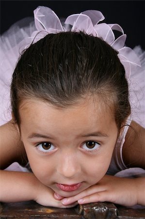 Beautiful brunette ballet girl lying on her tummy Stock Photo - Budget Royalty-Free & Subscription, Code: 400-04324089