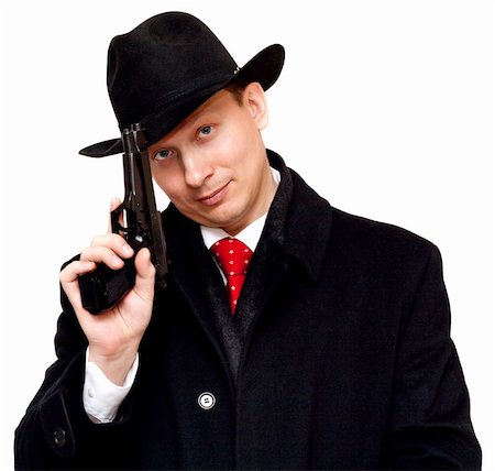 security guard gun - Man in suit, red tie with gun on white background Stock Photo - Budget Royalty-Free & Subscription, Code: 400-04324123