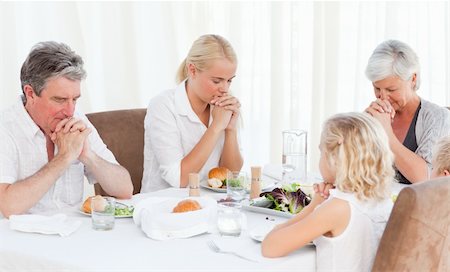 praying at table - Pretty family praying at the table Stock Photo - Budget Royalty-Free & Subscription, Code: 400-04324443