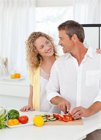 simsearch:400-05744780,k - Couple cooking together in their kitchen at home Stock Photo - Budget Royalty-Free & Subscription, Code: 400-04324751