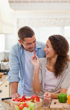 simsearch:400-05744780,k - Man eating vegetables with his wife at home Stock Photo - Budget Royalty-Free & Subscription, Code: 400-04325207