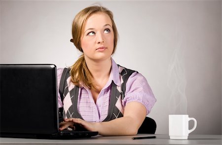 plump girls - young woman is working on laptop  at office Stock Photo - Budget Royalty-Free & Subscription, Code: 400-04325514