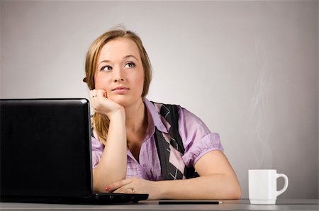 plump girls - young woman is working on laptop  at office Stock Photo - Budget Royalty-Free & Subscription, Code: 400-04325515