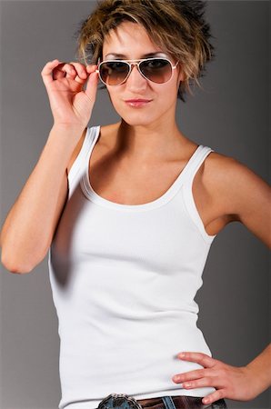 simsearch:400-04856416,k - woman wearing white tank top and jeans Stock Photo - Budget Royalty-Free & Subscription, Code: 400-04325978