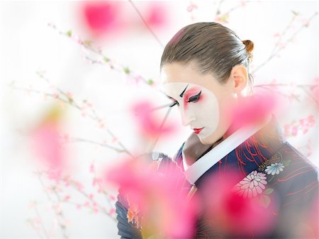 Artistic portrait of japan geisha woman with creative make-up near sakura tree in kimono Stock Photo - Budget Royalty-Free & Subscription, Code: 400-04326145
