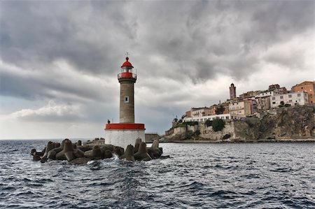 simsearch:841-06445552,k - France, Corsica, Bastia, view of the port light and the town Stock Photo - Budget Royalty-Free & Subscription, Code: 400-04326308