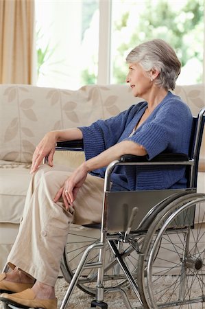 Retired woman in her wheelchair at home Stock Photo - Budget Royalty-Free & Subscription, Code: 400-04326318