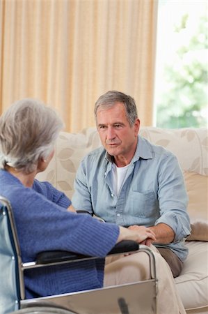 Senior couple talking in the living room at home Stock Photo - Budget Royalty-Free & Subscription, Code: 400-04326312