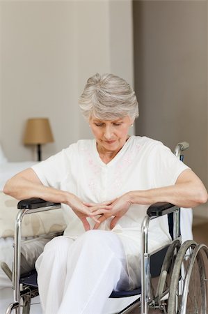 Senior woman asleep in her wheelchair at home Stock Photo - Budget Royalty-Free & Subscription, Code: 400-04326669