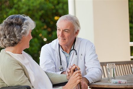 elder care - Senior doctor talking with his mature patient Stock Photo - Budget Royalty-Free & Subscription, Code: 400-04326782