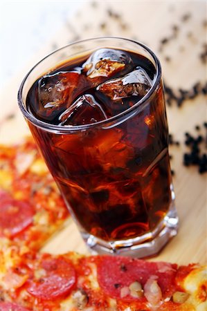 soda in glass - Fresh pizza with salami and mushrooms and cold cola drink Stock Photo - Budget Royalty-Free & Subscription, Code: 400-04329220