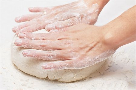 simsearch:649-06845217,k - Pair of hands kneading pizza dough. Stock Photo - Budget Royalty-Free & Subscription, Code: 400-04329734
