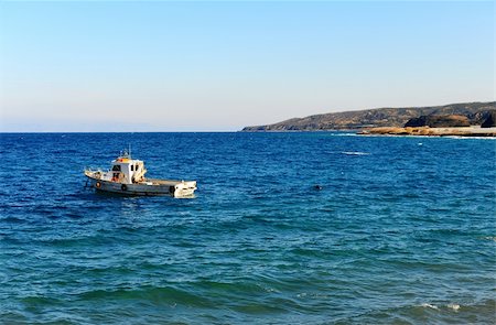 simsearch:400-05896461,k - Seascape Greek Island of Rhodes With Anchored Ship Stock Photo - Budget Royalty-Free & Subscription, Code: 400-04321139