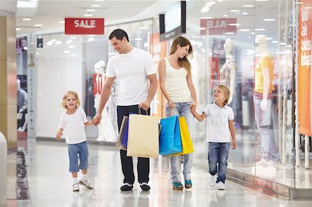 small shop interior - Young family with two children walking to the shops Stock Photo - Budget Royalty-Free & Subscription, Code: 400-04322095