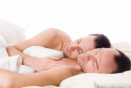 Happy homo couple in a white bed taking care of his boyfriend Stock Photo - Budget Royalty-Free & Subscription, Code: 400-04322404