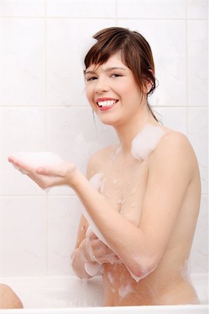 Young woman relaxing in a bath Stock Photo - Budget Royalty-Free & Subscription, Code: 400-04335021