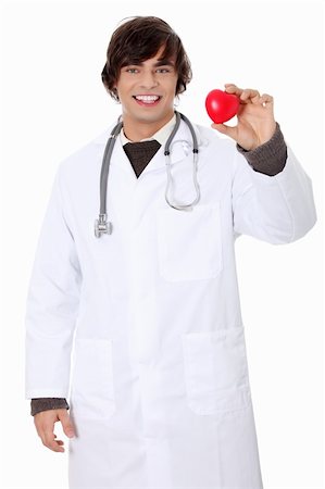simsearch:400-07222508,k - Happy handsome young male doctor holding heart shape toy, isolated on white Photographie de stock - Aubaine LD & Abonnement, Code: 400-04335234