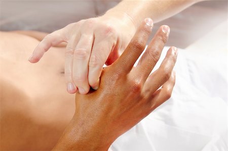 simsearch:400-05318677,k - digital pressure hands reflexology massage tuina therapy physiotherapy Stock Photo - Budget Royalty-Free & Subscription, Code: 400-04336999