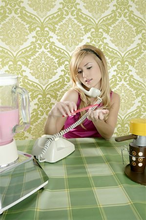 simsearch:400-04831298,k - Housewife retro vintage talking phone kitchen nail file Stock Photo - Budget Royalty-Free & Subscription, Code: 400-04330303