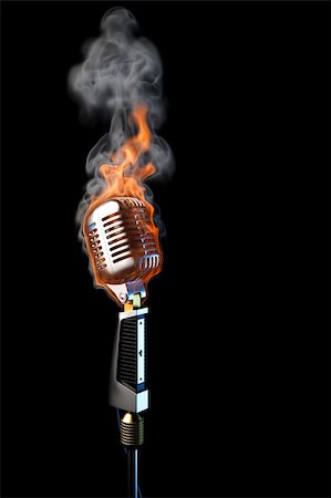 old mic in flames. isolated on black. Stock Photo - Budget Royalty-Free & Subscription, Code: 400-04331051