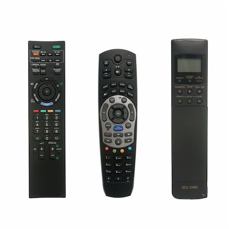 Three remote control devices isolated on white background. Stock Photo - Budget Royalty-Free & Subscription, Code: 400-04333846