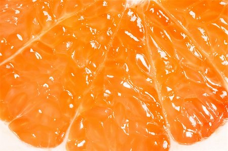 simsearch:400-06513460,k - Close up half of ripe grapefruit. Food background. Stock Photo - Budget Royalty-Free & Subscription, Code: 400-04344786
