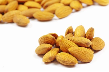 simsearch:400-04833195,k - almonds isolated on a white Stock Photo - Budget Royalty-Free & Subscription, Code: 400-04347313
