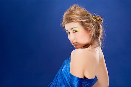 simsearch:400-04653285,k - woman with glamour make-up on blue background Photographie de stock - Aubaine LD & Abonnement, Code: 400-04349093