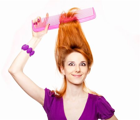 simsearch:400-04658893,k - Funny red-haired girl with big comb. Photographie de stock - Aubaine LD & Abonnement, Code: 400-04349336
