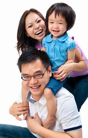 Happy Asian family on white background Stock Photo - Budget Royalty-Free & Subscription, Code: 400-04342530