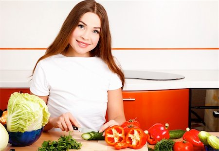 simsearch:400-05744780,k - beautiful caucasian woman in the kitchen Stock Photo - Budget Royalty-Free & Subscription, Code: 400-04354020