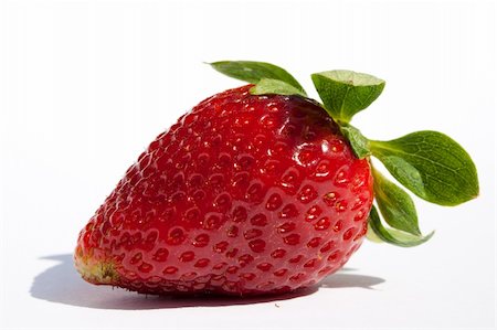 simsearch:400-05370991,k - A single strawberry on a white table Stock Photo - Budget Royalty-Free & Subscription, Code: 400-04354634