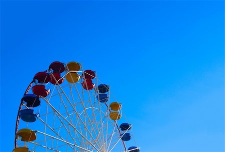 simsearch:400-08403714,k - Ferris wheel against blue sky Stock Photo - Budget Royalty-Free & Subscription, Code: 400-04355246