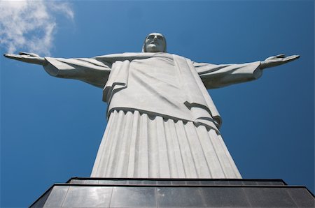 simsearch:400-07111236,k - The statue sits atop Corcovado mountain and overlooks the city. Stock Photo - Budget Royalty-Free & Subscription, Code: 400-04355439