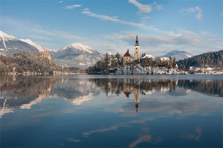 View on lake Bled with small island with church and castle on rock in Slovenia, Europe. Stock Photo - Budget Royalty-Free & Subscription, Code: 400-04355944