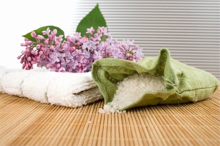 spa water background pictures - Towel, a branch of lilac and green bag with scattered sea salt Stock Photo - Budget Royalty-Free & Subscription, Code: 400-04355958