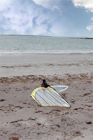 simsearch:400-03992760,k - windsurfer getting equipment ready on the beach in the maharees county kerry ireland Stock Photo - Budget Royalty-Free & Subscription, Code: 400-04356598