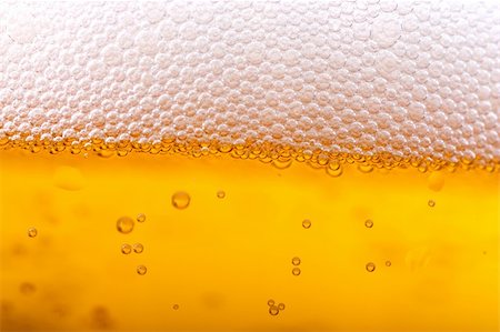 Orange beer and white froth background. Closeup view. Stock Photo - Budget Royalty-Free & Subscription, Code: 400-04350005