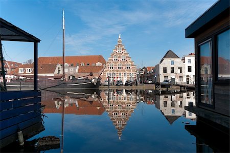 monumental houses reflected in a canal in Leiden, Netherlands Stock Photo - Budget Royalty-Free & Subscription, Code: 400-04350416