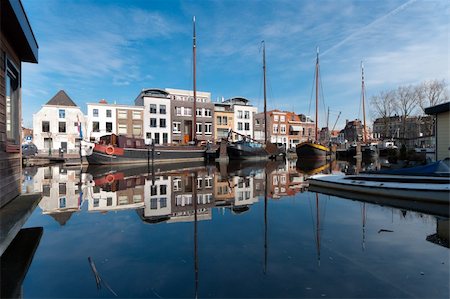 monumental houses reflected in a canal in Leiden, Netherlands Stock Photo - Budget Royalty-Free & Subscription, Code: 400-04350420