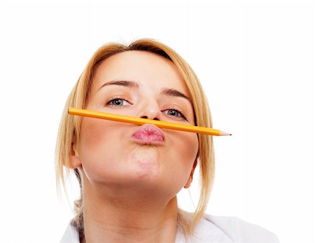 simsearch:400-04351235,k - Business woman holding a pancil by lips Stock Photo - Budget Royalty-Free & Subscription, Code: 400-04351243