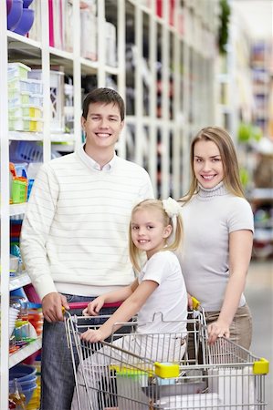 small shop interior - A young family is shopping in a store Stock Photo - Budget Royalty-Free & Subscription, Code: 400-04352670