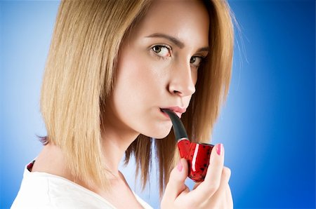 picture young girl smoking cigarette - Girl smoking pipe against the gradient background Stock Photo - Budget Royalty-Free & Subscription, Code: 400-04353337