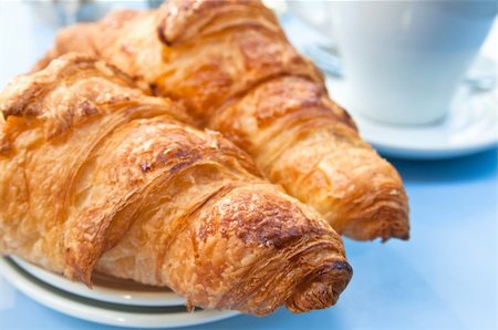 simsearch:400-05704519,k - Breakfast with coffee and croissants in a basket on table Stock Photo - Budget Royalty-Free & Subscription, Code: 400-04364959