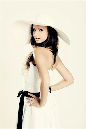 simsearch:400-04655693,k - Beautiful and fashion young woman posing and wearing a wonderful white dress with a white hat Stock Photo - Budget Royalty-Free & Subscription, Code: 400-04367373