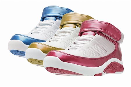 Row of colorful basketball trainers on white background Photographie de stock - Aubaine LD & Abonnement, Code: 400-04360361