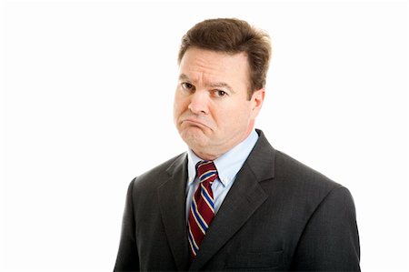 sympathy - Businessman with a very sad, sarcastic expression of mock sympathy. Isolated on white. Stock Photo - Budget Royalty-Free & Subscription, Code: 400-04374234