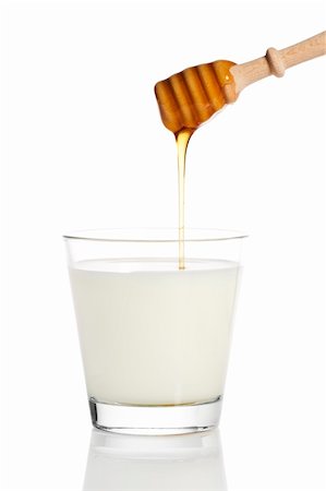 robstark (artist) - honey falling from a honey dipper in a glass of milk on white background Stock Photo - Budget Royalty-Free & Subscription, Code: 400-04375011