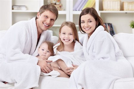 A family with two children at home Stock Photo - Budget Royalty-Free & Subscription, Code: 400-04375695